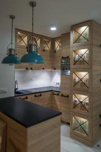 Kjøkken eller kjøkkenkrok på Apartament Batorego 713