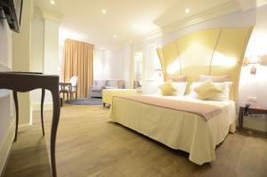 מיטה או מיטות בחדר ב-Hotel Campo Marzio