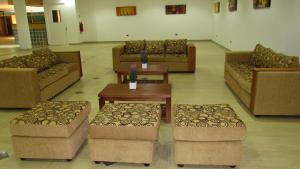 Χώρος καθιστικού στο Hotel Astore Suites
