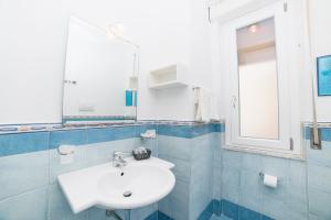Koupelna v ubytování Hotel De Rosa