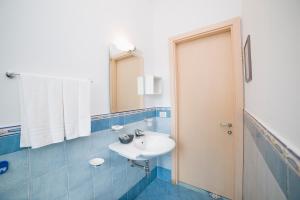 Koupelna v ubytování Hotel De Rosa