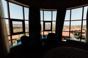 Posezení v ubytování Khan-Chinar Hotel