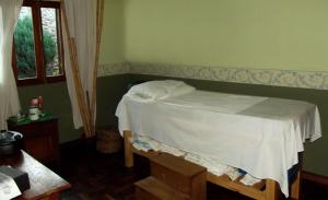 Postel nebo postele na pokoji v ubytování Alquimia Posada