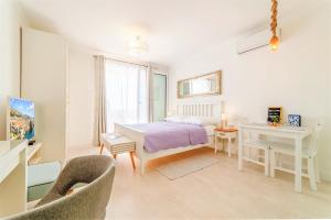 Posteľ alebo postele v izbe v ubytovaní Dubrovnik Colors - Old Town View Apartment No3
