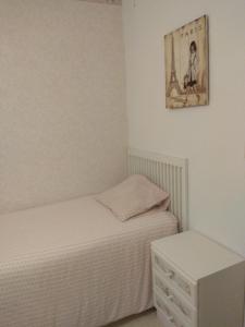 Ένα ή περισσότερα κρεβάτια σε δωμάτιο στο Almeria Home Experience +12 φωτογραφίες
