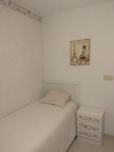 เตียงในห้องที่ Almeria Home Experience