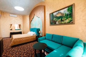 Postel nebo postele na pokoji v ubytování Khan-Chinar Hotel