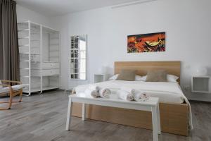 Posteľ alebo postele v izbe v ubytovaní Camarò Favignana