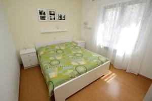 Postel nebo postele na pokoji v ubytování Apartments Besker