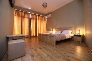 Postel nebo postele na pokoji v ubytování Hotel Traveler