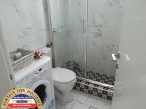 A bathroom at HELLENIC ESTATE SUITES