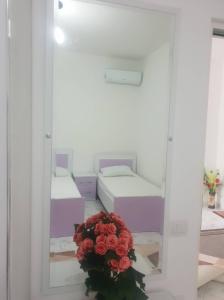 Postel nebo postele na pokoji v ubytování Guesthouse Anila