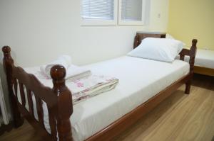 Postel nebo postele na pokoji v ubytování Dora Apartment