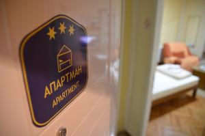 Postel nebo postele na pokoji v ubytování Dora Apartment