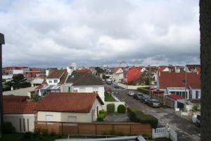 a view of a town with houses and cars at calypso 2 in Berck-sur-Mer +4 photos