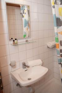 Koupelna v ubytování Gioma Hotel