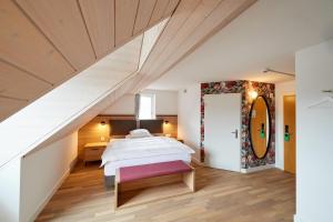Säng eller sängar i ett rum på Hotel Restaurant zum goldenen Kopf