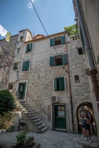 a group of people standing in front of a building at JR Luxury Guesthouse2 in Split