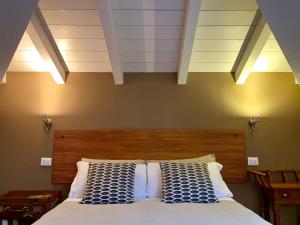 Postel nebo postele na pokoji v ubytování Porta Ronca - B&B, Suites & Apts