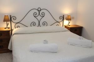 Postel nebo postele na pokoji v ubytování Litto Appartamenti