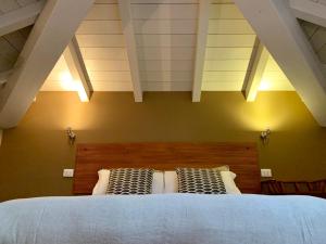 Postel nebo postele na pokoji v ubytování Porta Ronca - B&B, Suites & Apts