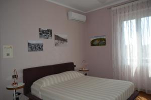 Posteľ alebo postele v izbe v ubytovaní ilGirasole b&b