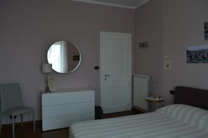Posteľ alebo postele v izbe v ubytovaní ilGirasole b&b