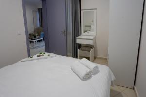 Ванная комната в Mitos Apartments