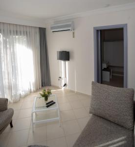 Гостиная зона в Mitos Apartments