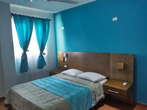 Ένα ή περισσότερα κρεβάτια σε δωμάτιο στο Figaro Hotel Samana