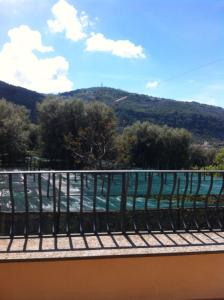 a balcony with a view of a mountain at Casa Iolanda in Sorrento