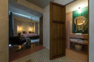 Posteľ alebo postele v izbe v ubytovaní The Riad - Adults Only