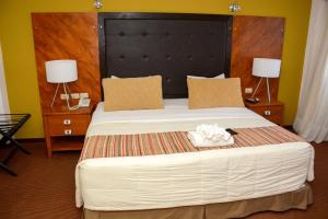 Krevet ili kreveti u jedinici u objektu leclub resort hotel
