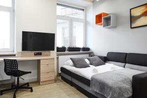 Televisyen dan/atau pusat hiburan di Compact Studios Słowackiego Avenue