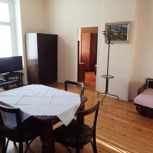 a dining room with a table and chairs and a room at Pension Prislin in Litoměřice +46 photos