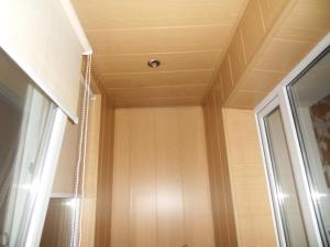 a ceiling in a room with a window at Карасай Батыра 108 in Almaty