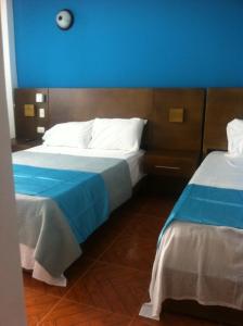 Ένα ή περισσότερα κρεβάτια σε δωμάτιο στο Figaro Hotel Samana