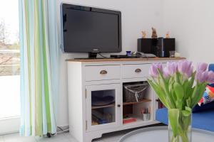 TV a/nebo společenská místnost v ubytování Ferienwohnung Kästle
