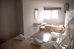 Posteľ alebo postele v izbe v ubytovaní Oniro Rooms & Suites