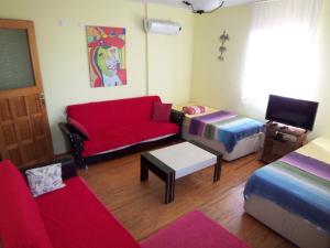 Кровать или кровати в номере izmir Tatil Evi Beach Resort Seferihisar
