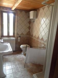 Ванная комната в All'ombra degli Ulivi B&B