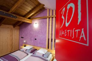 Postel nebo postele na pokoji v ubytování Hotel Marzia