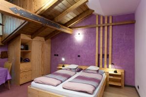 Postel nebo postele na pokoji v ubytování Hotel Marzia