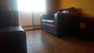 Posezení v ubytování Habitaciones y Apartamentos el Caleuche El Tabo