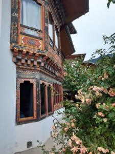 a window on the side of a building at Kisa Villa in Thimphu