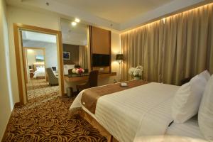 Postel nebo postele na pokoji v ubytování Tenera Hotel + 22 fotografií