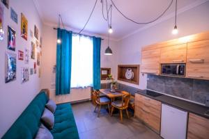 Kuchyň nebo kuchyňský kout v ubytování ATRIUM 24 Studio