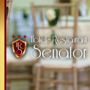 a sign for a hotel restaurant seniorctor with a crest at Hotel Senator in Slatina