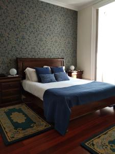 En eller flere senge i et værelse på Quinta da Ermida - Turismo de Habitacao
