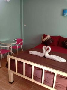 Postel nebo postele na pokoji v ubytování Chandra Hostel Koh Tao